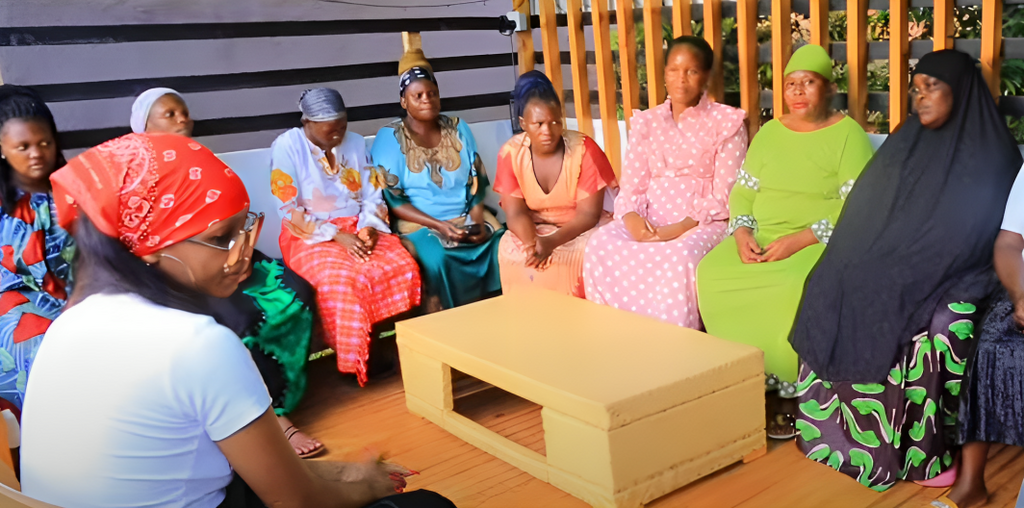 Spice Diana meeting the women at her home in Makindye