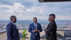 Suuna Ben (right) with Next Media CEO Kin Kariisa (left) and his deputy Joe Kigozi