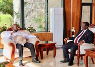 President Yoweri Museveni (L) with Dr. Musalia Mudavadi, Kenya's Prime Cabinet Secretary