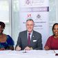 Mukawa (Hotels) Holdings Ltd Directors Ms Clare Njeri Githunguri (left) and Ms Lilian Joy Nyagaki Githunguri (right) exchange the hotel management agreements with Swiss-Belhotel International’s Senior Vice President Laurent Voivenel (centre)