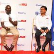 Stanbic's Israel Arinaitwe and Satish Guna, the Century Cinemax General Manager address press