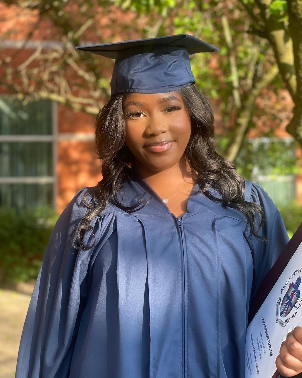 Esther Mutesasira recently graduated High School