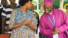 Patience Rwabwogo with Rt Rev Nathan Ahimbisibwe at the crusade