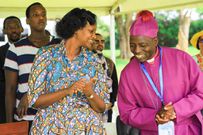Patience Rwabwogo with Rt Rev Nathan Ahimbisibwe at the crusade