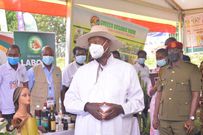 Museveni inspects the workers' exhibition at the function