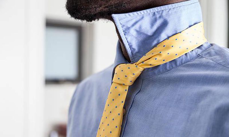 A man wearing a neck tie