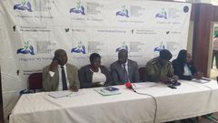 Kirenga (middle) with other officials during the press conference at Jinja City Hall