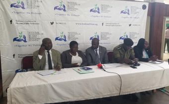 Kirenga (middle) with other officials during the press conference at Jinja City Hall