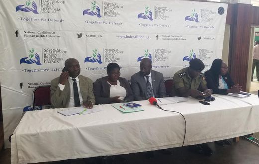 Kirenga (middle) with other officials during the press conference at Jinja City Hall