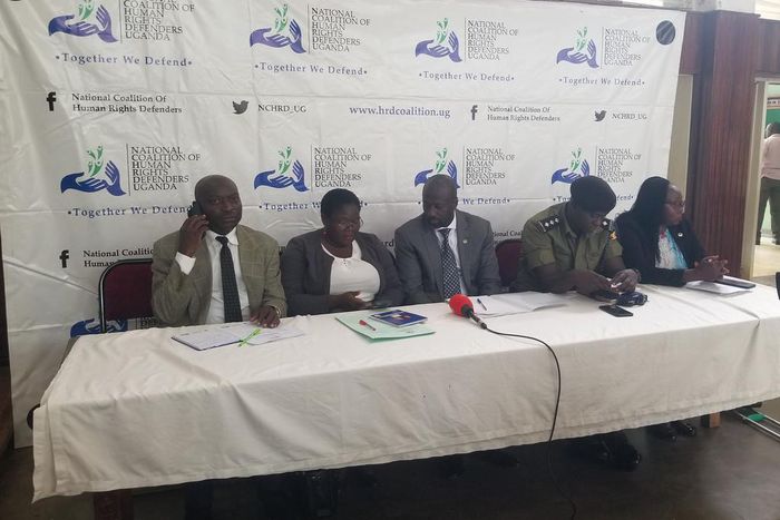 Kirenga (middle) with other officials during the press conference at Jinja City Hall