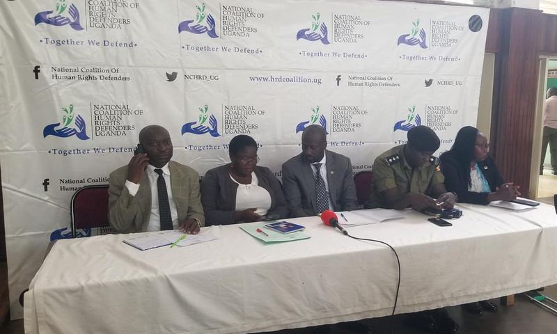 Kirenga (middle) with other officials during the press conference at Jinja City Hall