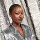 Oscar winner Lupita Nyong'o posed against the silver backdrop in a sequinned silver blazer dress.