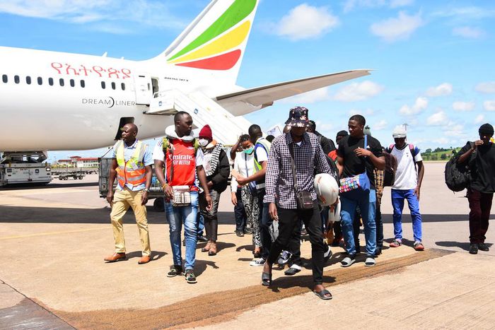 The returnees on arrival at Entebbe International Airport