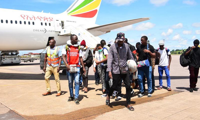 The returnees on arrival at Entebbe International Airport