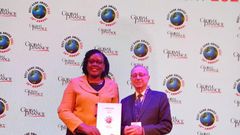 The Bank's General Manager Corporate Communication and Marketing, Ms Beatrice Lugalambi receiving the award in Morocco