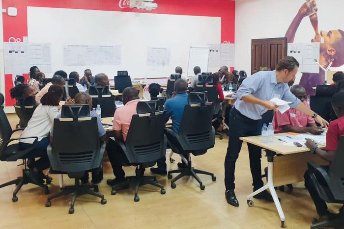 CCBU Staff at work The comany was crowed the Most admired brand in Uganda