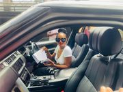 Diana posing in her new car