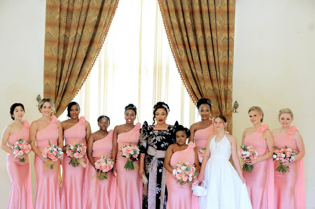 Mrs Kayanja, the bride and her maids
