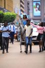 Karole Kasita arriving for her press conference on a horse