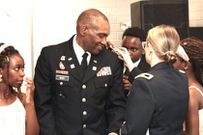 Lt. Col Frank Musisi being pipped