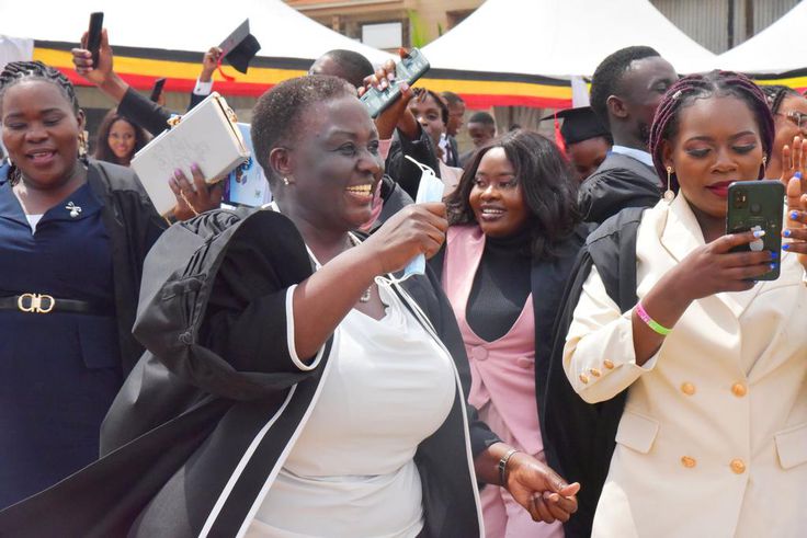 Former Vice President Dr Specioza Wandira Kazibwe joined fellow graduates for a celebratory dance