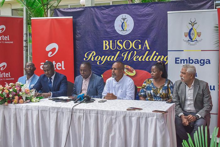 Osuman Alunul Ahmed, the Deputy Prime Minister of Busoga and  Japhet Aritho, the MD, Airtel Money addressing press at the Kampala Sheraton