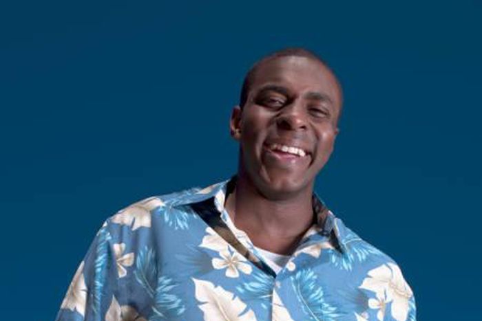 A man in a flowery pattern shirt