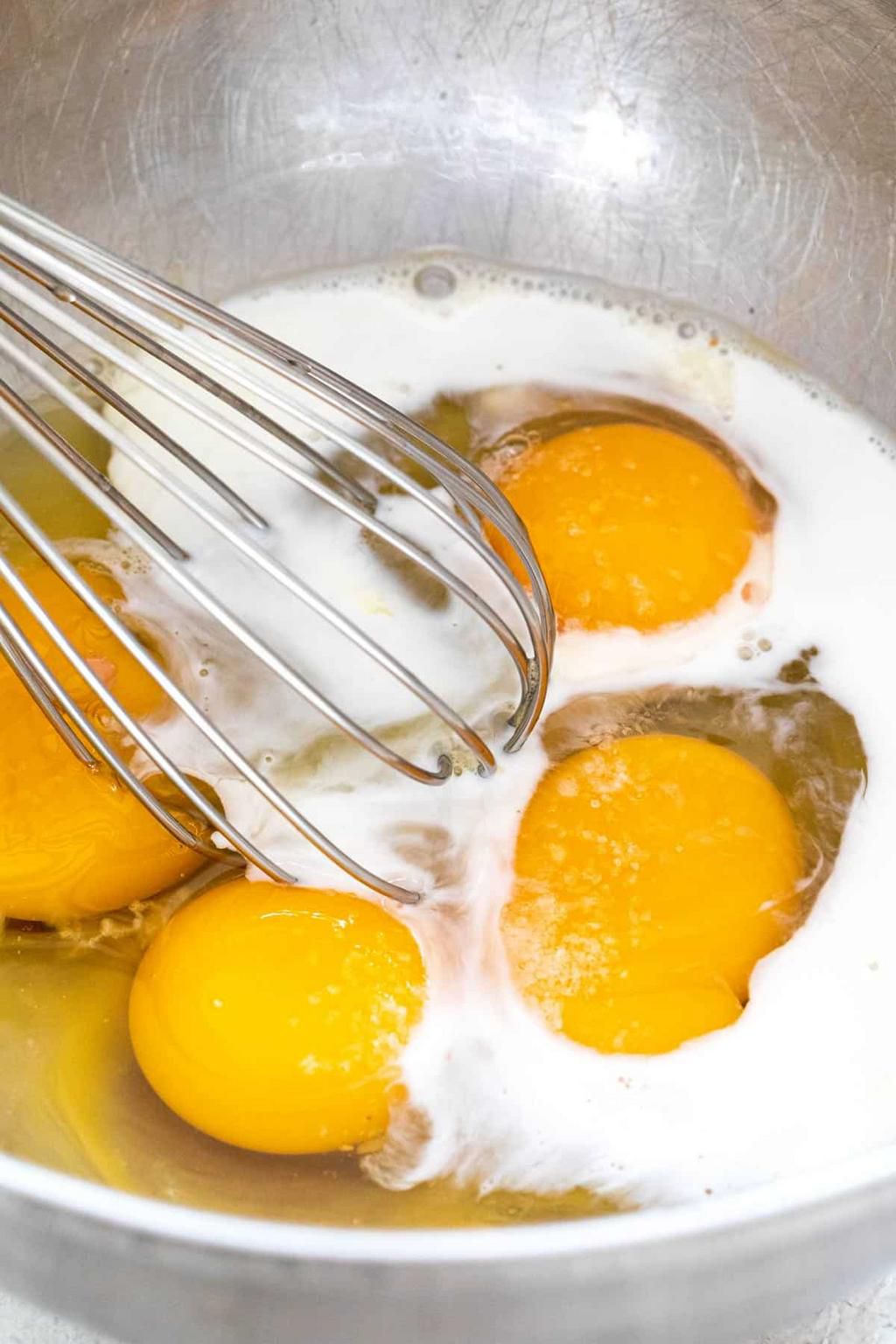 Crack the eggs, add the milk and whisk [JessicaGavin]