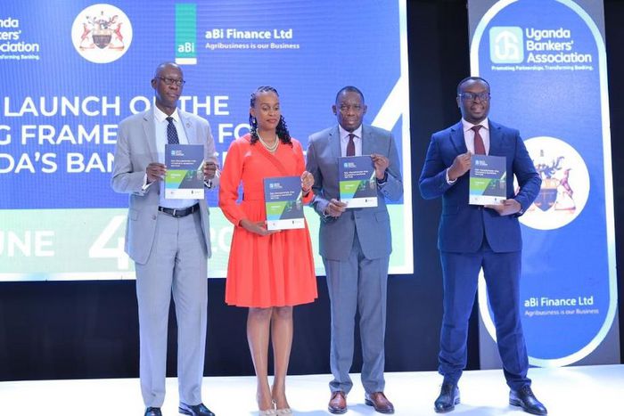 L-R: UBA Executive Director, Wilbrod Owor, Mona Muguma Ssebuliba from aBi Finance, BOU Deputy Governor, Michael Atingi-Ego and Julius Kakeeto, the UBA Chairman at the launch of the ESG framework