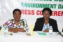 Susan Wasubire from the Climate Action Network Uganda (CANU) (R) and Caritas' Betty Aguti