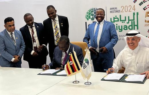 Matia Kasaija signed the loan deal on behalf of Uganda