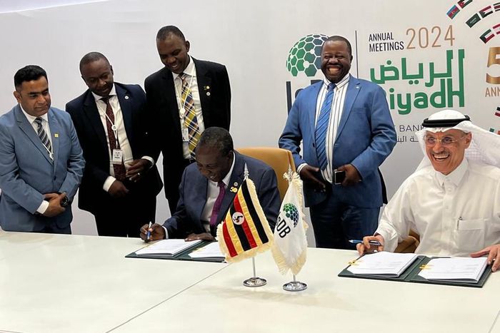 Matia Kasaija signed the loan deal on behalf of Uganda