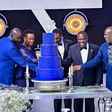 dfcu Bank management, and Guest of honor cutting cake during dfcu bank's 60 year anniverssary celebrations at Mestil Hotel