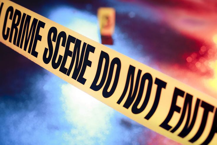 "DO NOT ENTER" tape in front of a crime sceneFer Gregory/Shutterstock