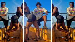 Awilo Longomba retires drink on Ritah Dancehall's backside on sailing excursion/Instagram