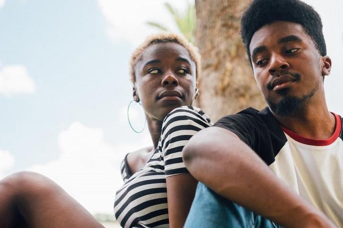 Man sitting beside a woman [Image: Joshua McKnight]