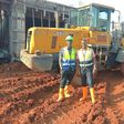 Atwine (right) with one of his workmates at a construction site
