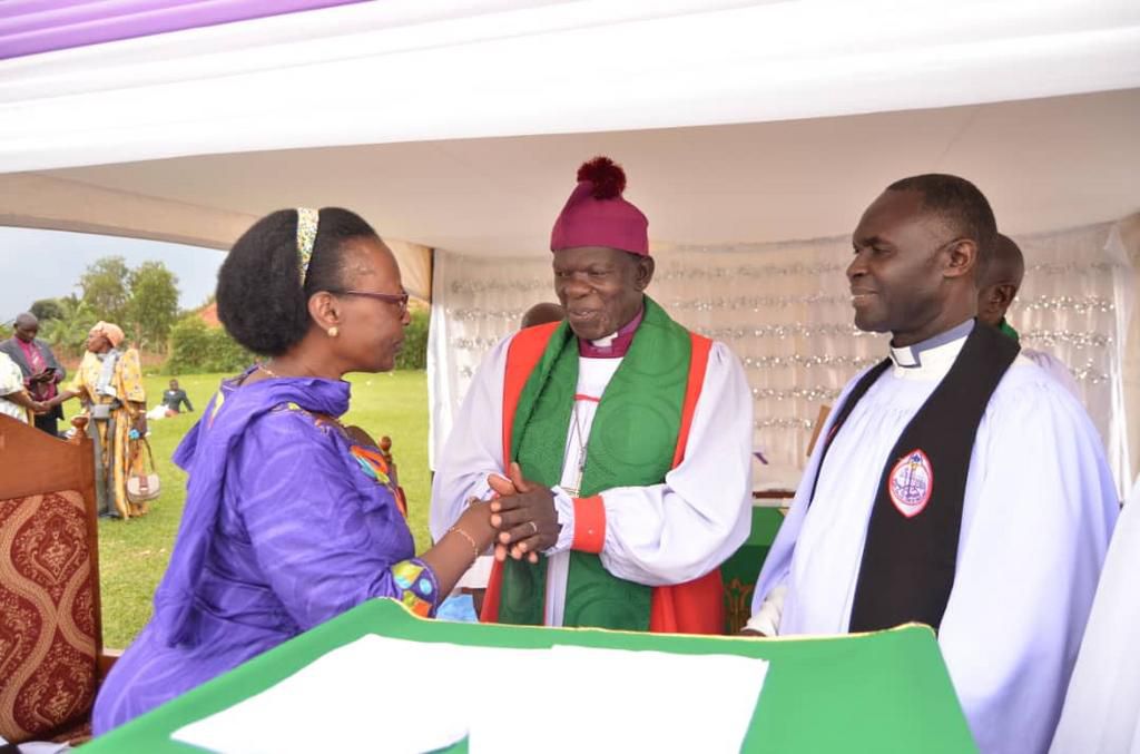 Minister Kaboyo with  Acting Luwero Bishop James William Ssebaggala at the Golden Jubilee celebration