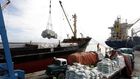 Kenyan port workers load relief food to a Somalia-bound ship at the Kenyan port of Mombasa, October 10 2011 . REUTERS/Joseph Okanga