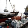 Kenyan port workers load relief food to a Somalia-bound ship at the Kenyan port of Mombasa, October 10 2011 . REUTERS/Joseph Okanga