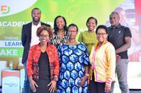 Minister Kaboyo posing with the academy founders and the panelists at the launch