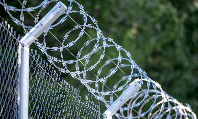 A metal fence with barbed wireJose A. Bernat Bacete/Getty Images