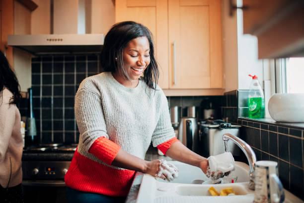 A woman washing the dishes