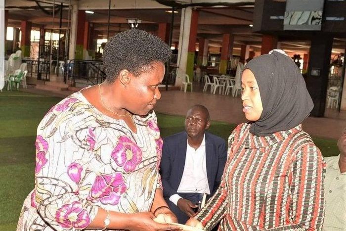 Vice President Jessica Alupo with one of the victims' family member