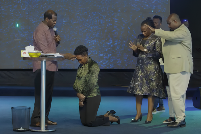 Pastor Kayanja prays for Minister Phiona Nyamutoro