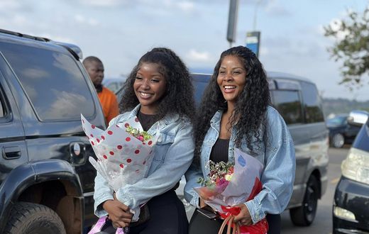 Desire Luzinda and her daughter Michelle arrived  back on the country on Wednesday