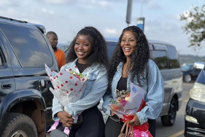 Desire Luzinda and her daughter Michelle arrived  back on the country on Wednesday