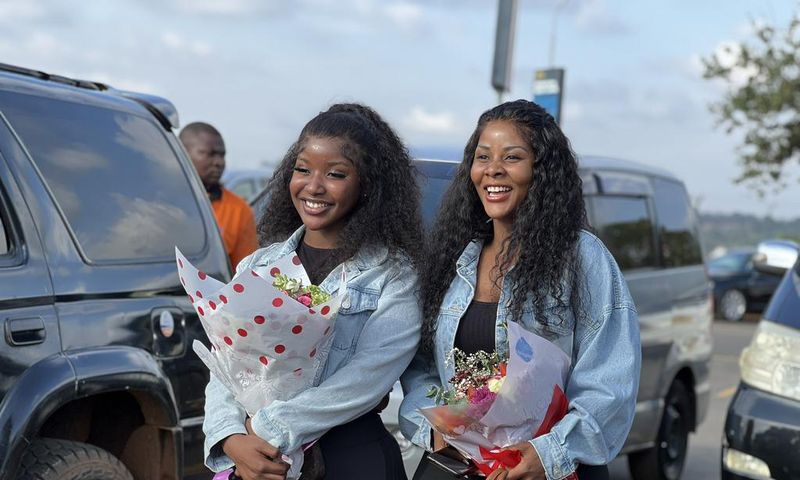 Desire Luzinda and her daughter Michelle arrived  back on the country on Wednesday
