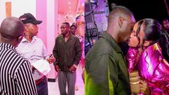 Rickman talking to Frank Gashumba. Rickman kissing Sheilah.