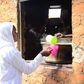 A student getting porridge from the Kitchen at Barakala Seed Secondary School